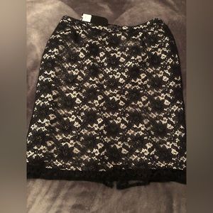 La Collection black lace skirt with nude under slip